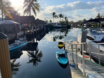 Waterfront Tiny House w Pool, Beach, and Boat Dock
