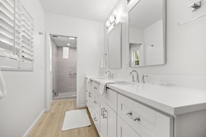 Combined shower/tub, hair dryer, towels - Gulfside Escape at Sea Twig #103- Relax & Unwind Steps to Sand & Pool by RVA (Longboat Key)