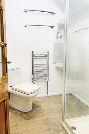 Bathtub, hair dryer, towels, soap