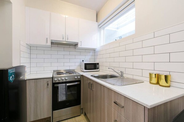 Fridge, microwave, oven, stovetop
