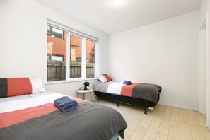 1 bedroom, desk, iron/ironing board, travel cot