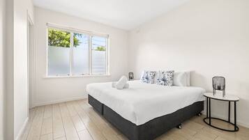 1 bedroom, desk, iron/ironing board, travel cot