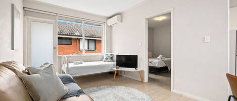 1 bedroom, desk, iron/ironing board, travel cot