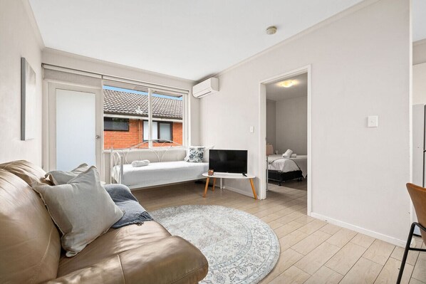 1 bedroom, desk, iron/ironing board, travel crib