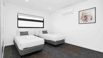 2 bedrooms, desk, iron/ironing board, travel cot