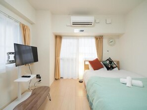 401 | Blackout drapes, iron/ironing board, free WiFi, bed sheets - Daruma apartment (Naha)