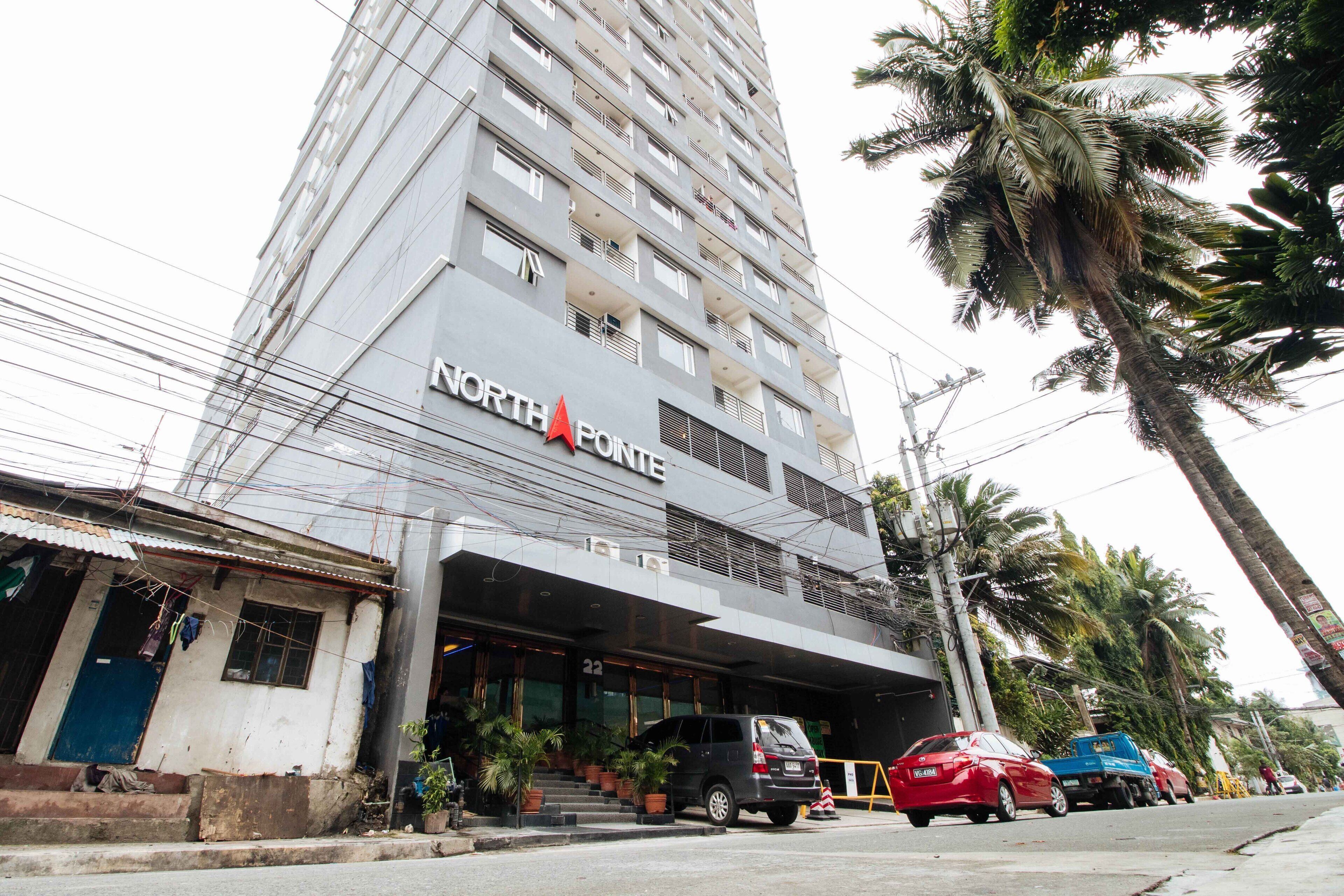 A multi-story building with a sign reading "NORTH FORTE".