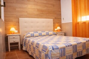 2 habitaciones, tabla de planchar con plancha y ropa de cama 