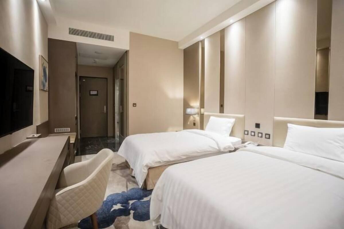 Hochwertige Bettwaren, Daunenbettdecken, Pillowtop-Betten, Minibar