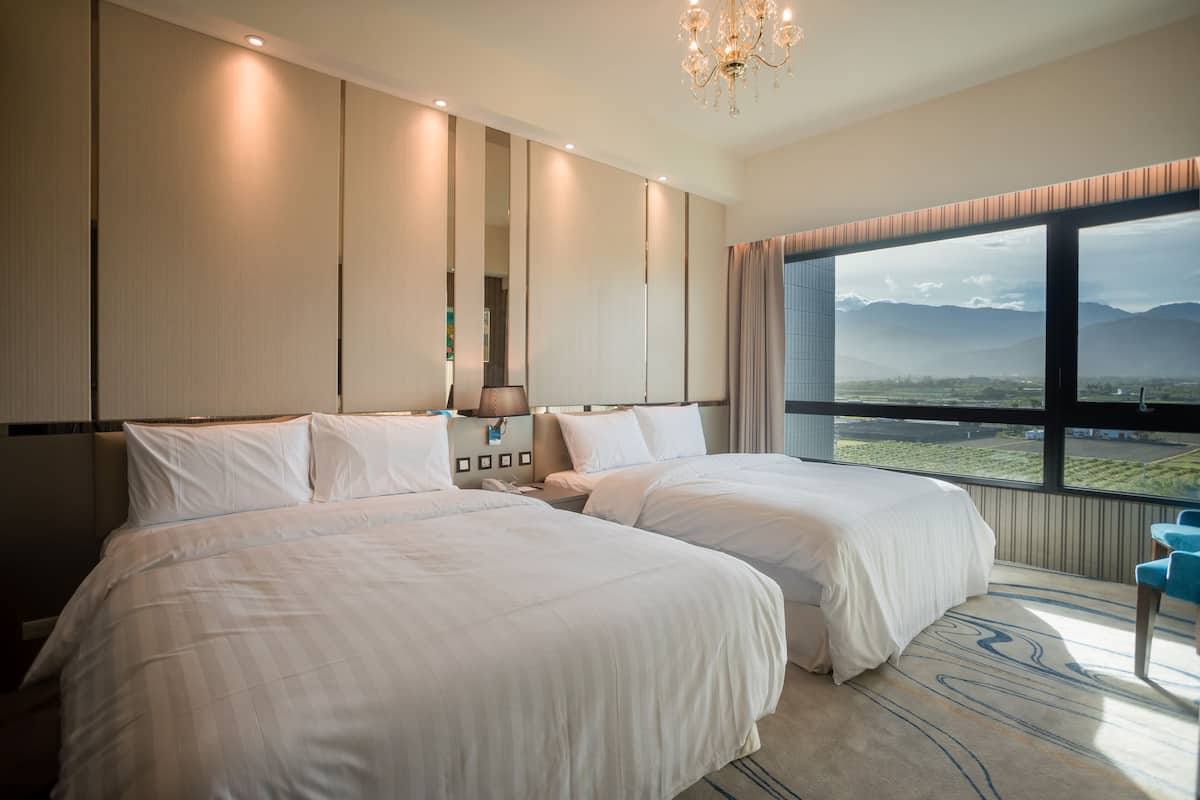 quadruple room, mountain view | premium bedding, down duvets, pillow-top beds, minibar