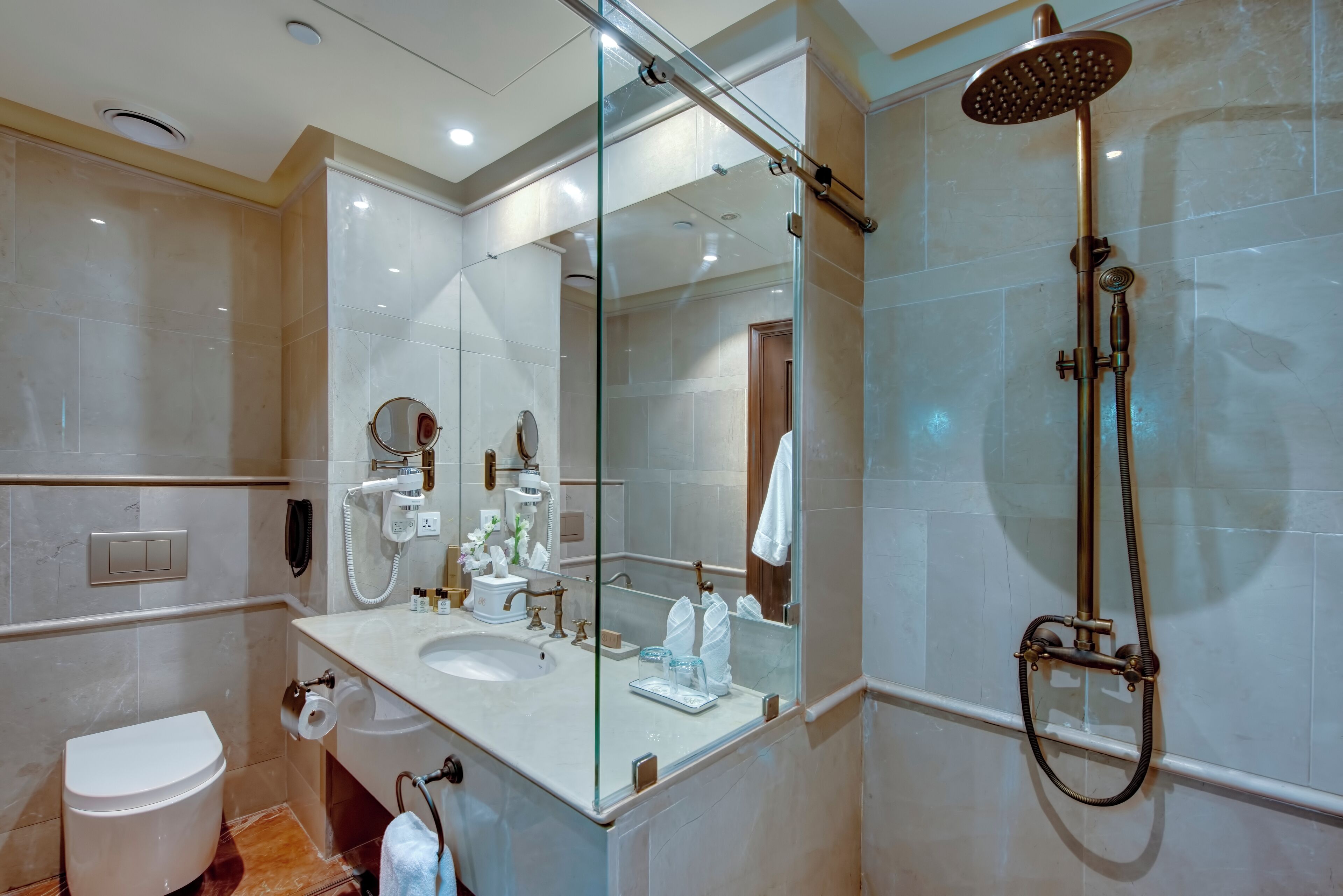 deluxe room, 1 king bed | bathroom | shower, free toiletries, hair dryer, bathrobes