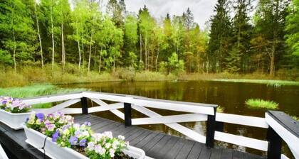 Holiday home in the forest, private garden, sauna