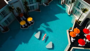 2 outdoor pools, pool umbrellas, pool loungers