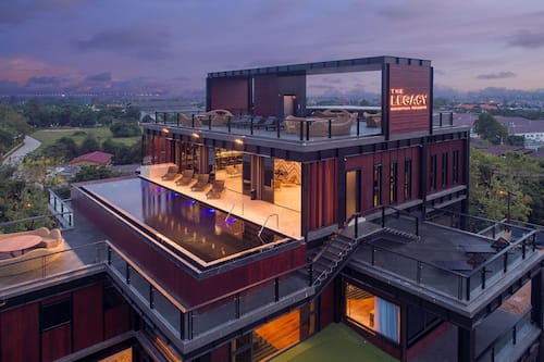The Legacy Conceptual Residence | Minibar, in-room safe, desk, laptop workspace