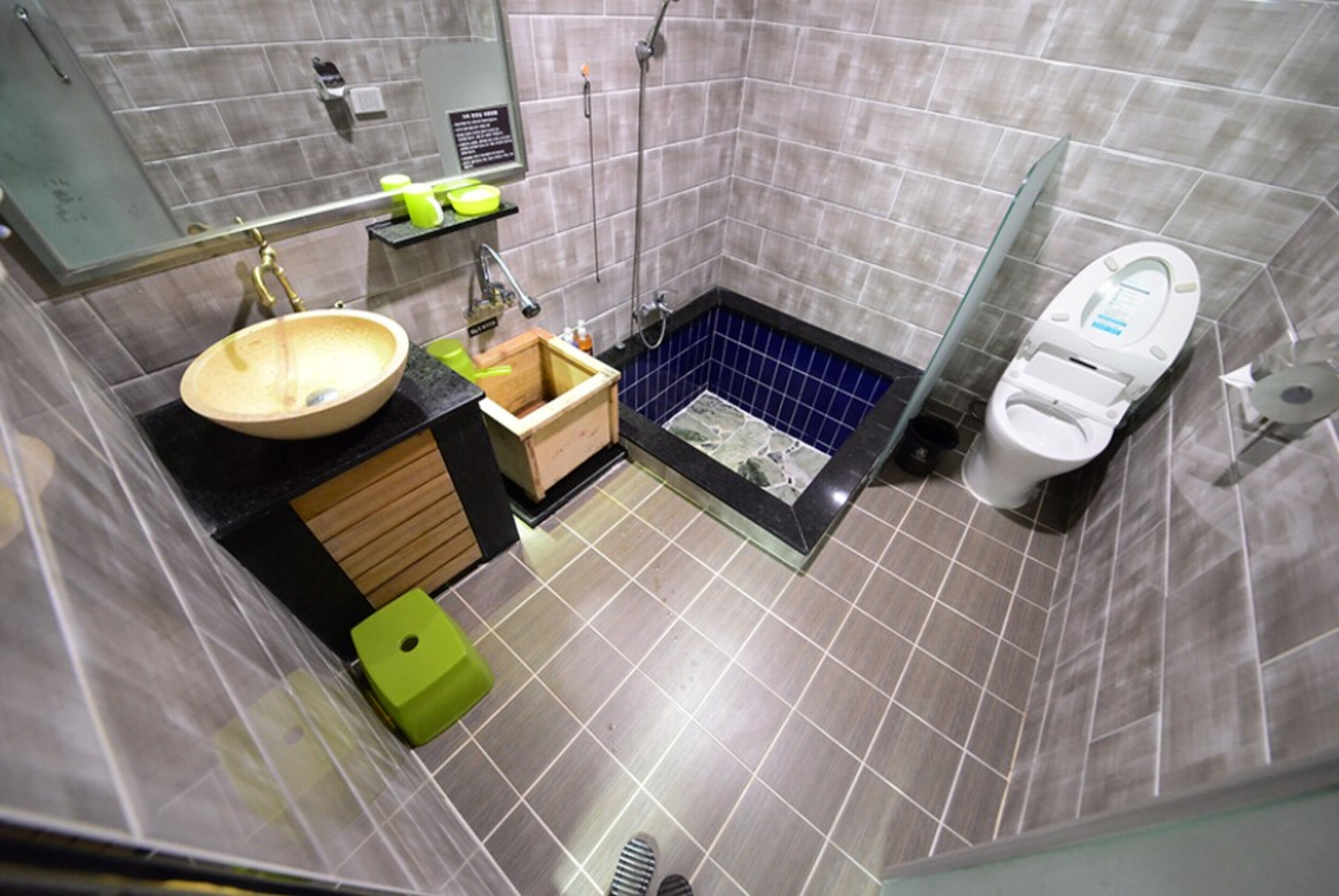 deep-soaking bathtub, free toiletries, hair dryer, heated floors