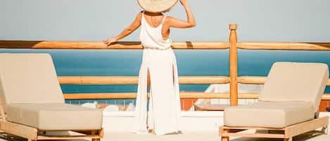 Seasonal outdoor pool, open 7:00 AM to 6:00 PM, pool umbrellas