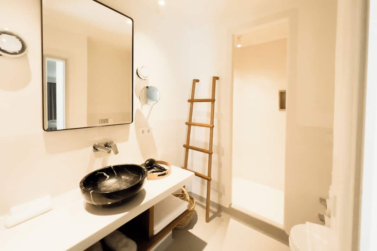 shower, rainfall showerhead, designer toiletries, hair dryer