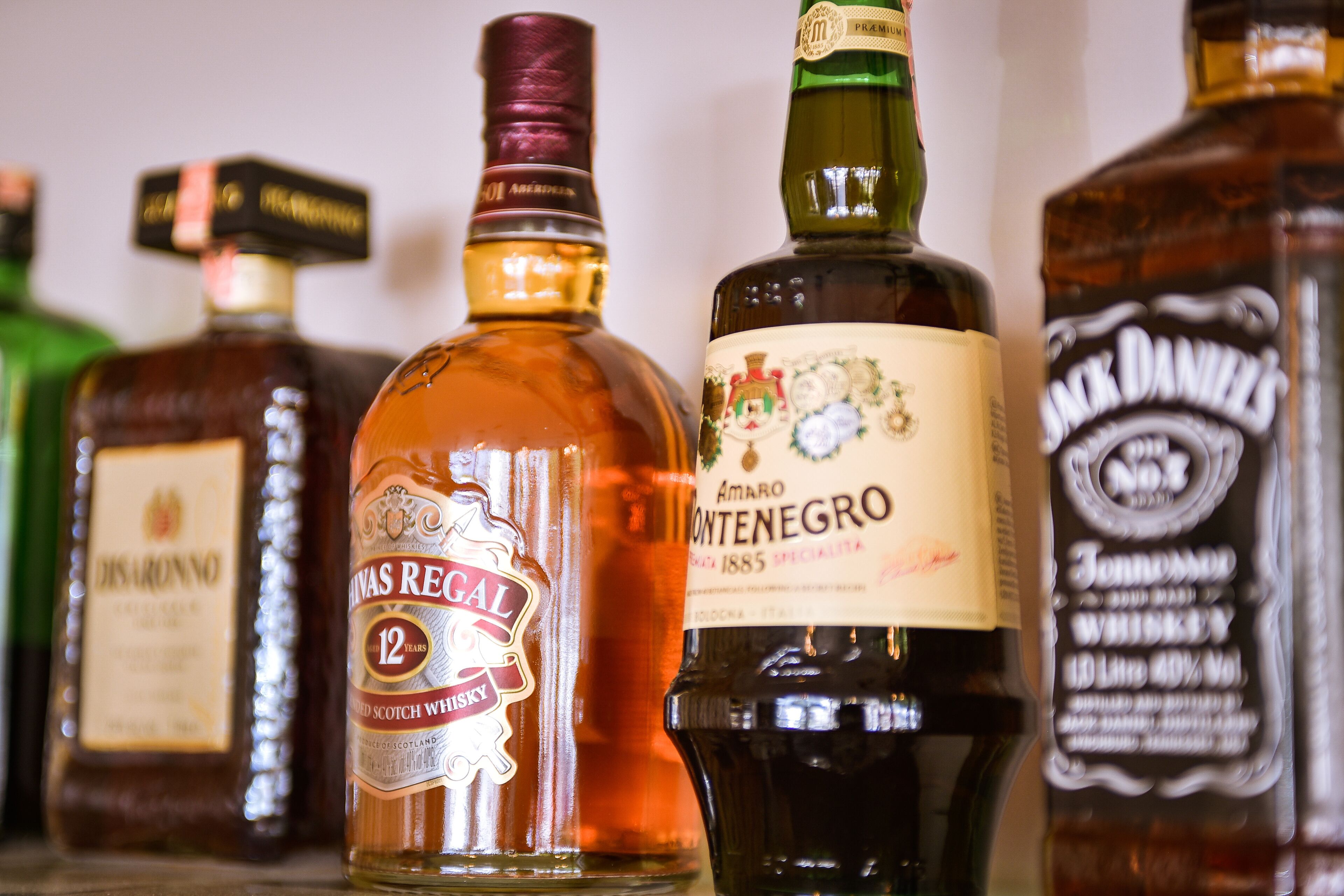 A collection of whiskey bottles.