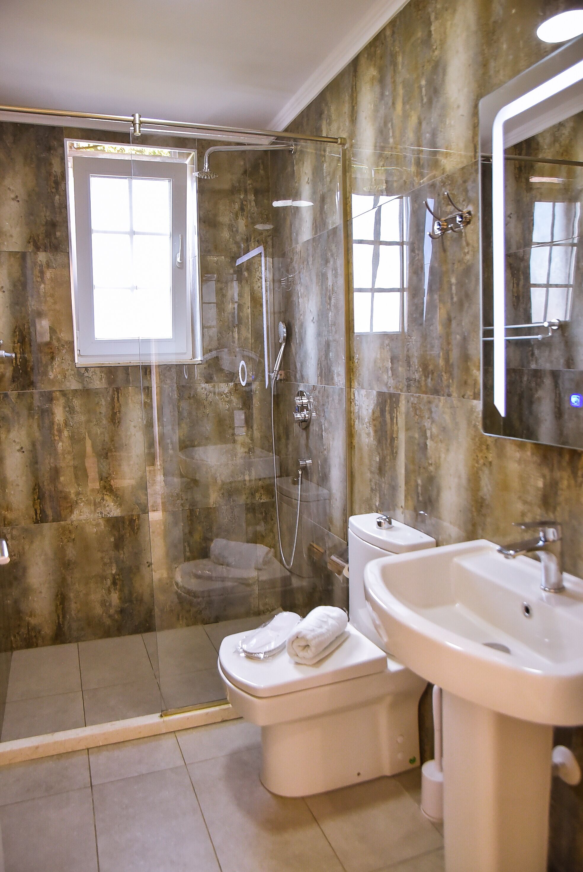 shower, free toiletries, hair dryer, slippers