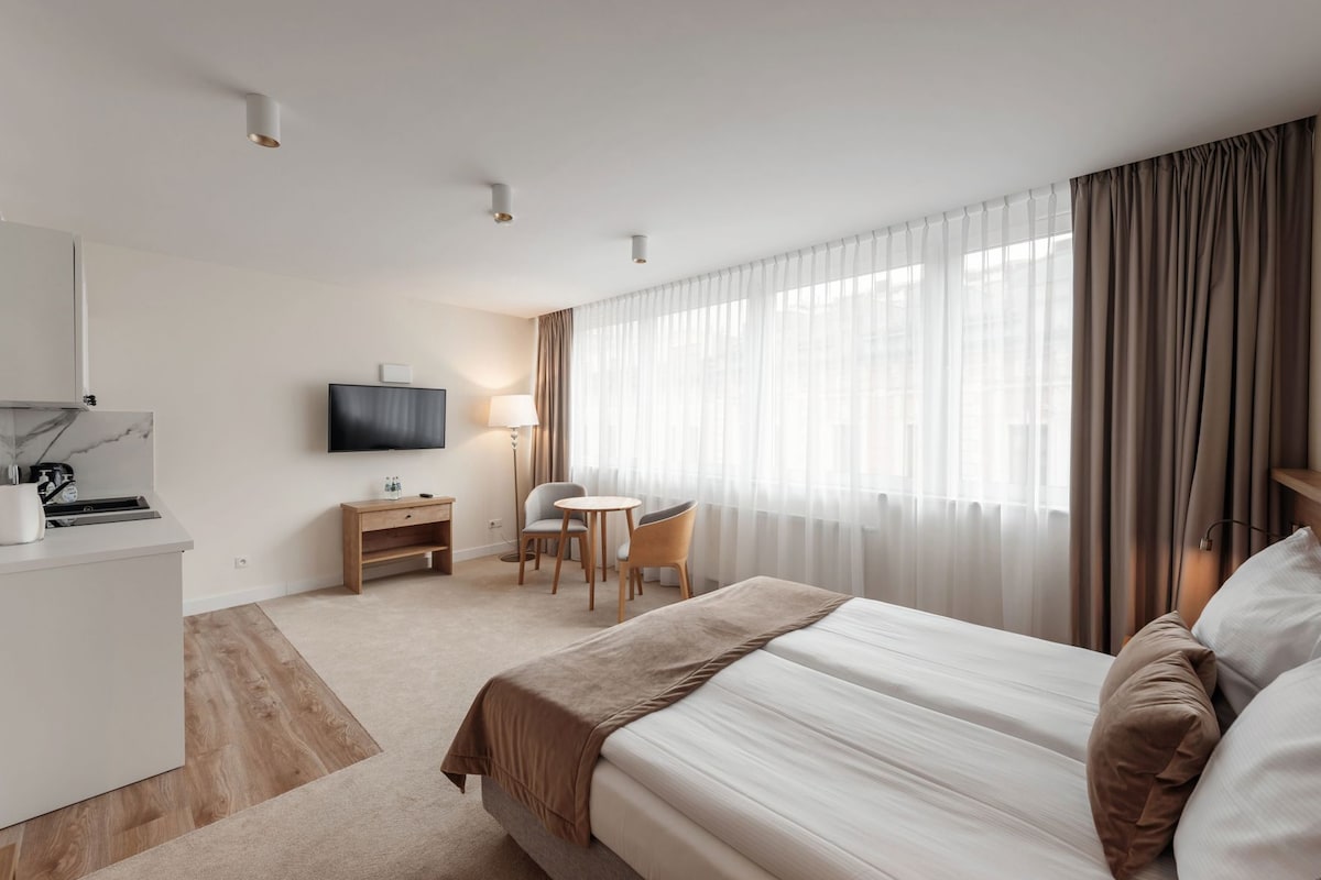 Blackout curtains, soundproofing, iron/ironing board (on request)