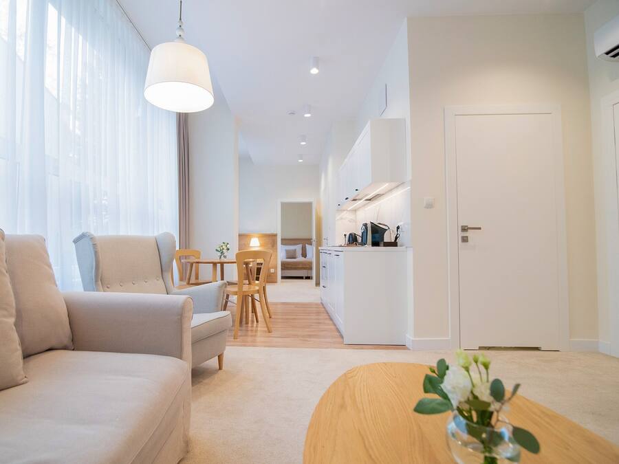 Deluxe Studio | Living area | Flat-screen TV