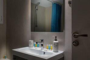 Apartment, 1 Bedroom | Bathroom | Combined shower/tub, free toiletries, hair dryer, towels - 64m² Newly Renovated Apartment in Athens (Nea Smirni)