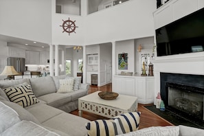 TV, fireplace, books, stereo