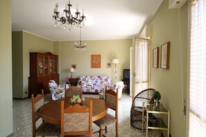 Apartment, 1 Bedroom | Living area | Flat-screen TV