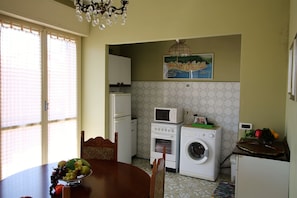 Apartment, 1 Bedroom | Private kitchenette | Full-sized fridge, microwave, oven, stovetop