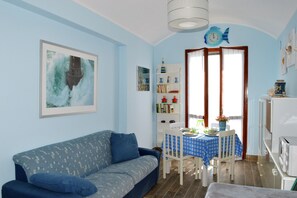 Appartement, 1 chambre | Coin séjour