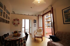 Apartment, 2 Bedrooms | Living area | Flat-screen TV