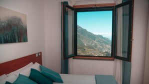 1 غرفة نوم ومكواة/لوح كي وواي فاي مجانًا وملاءات أسرّة