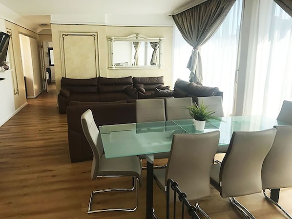 Panoramic Penthouse, 3 Bedrooms | Living area | TV, heated floors