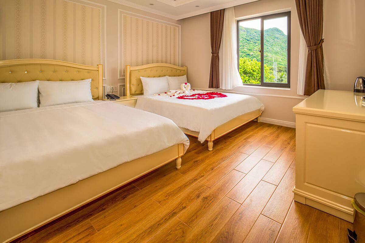 Superior Quadruple Room | Hypo-allergenic bedding available, minibar, desk, laptop workspace