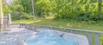 Waterfront retreat with private dock, wraparound deck & stunning lake views.