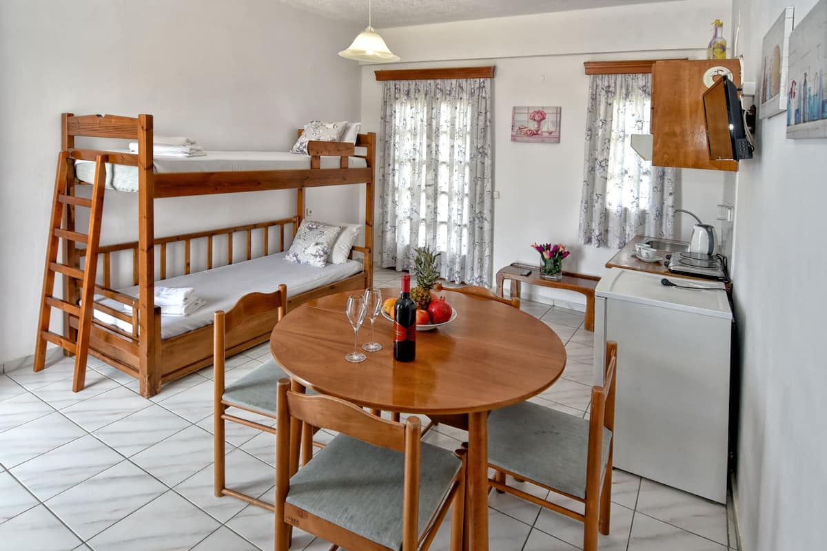 Family Apartment | Iron/ironing board (on request), bed sheets