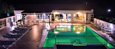 Outdoor pool, open 8:00 AM to 6:00 PM, pool umbrellas, sun loungers