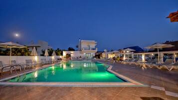 Outdoor pool, open 8:00 AM to 6:00 PM, pool umbrellas, pool loungers