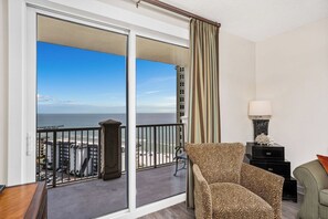TV, fireplace - Grand Panama gorgeous Oceanfront Condo-Sleeps 10! (Panama City Beach)
