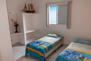 Quarto econômico | Wi-Fi de cortesia, roupa de cama