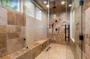 Combined shower/tub, hair dryer, towels, soap