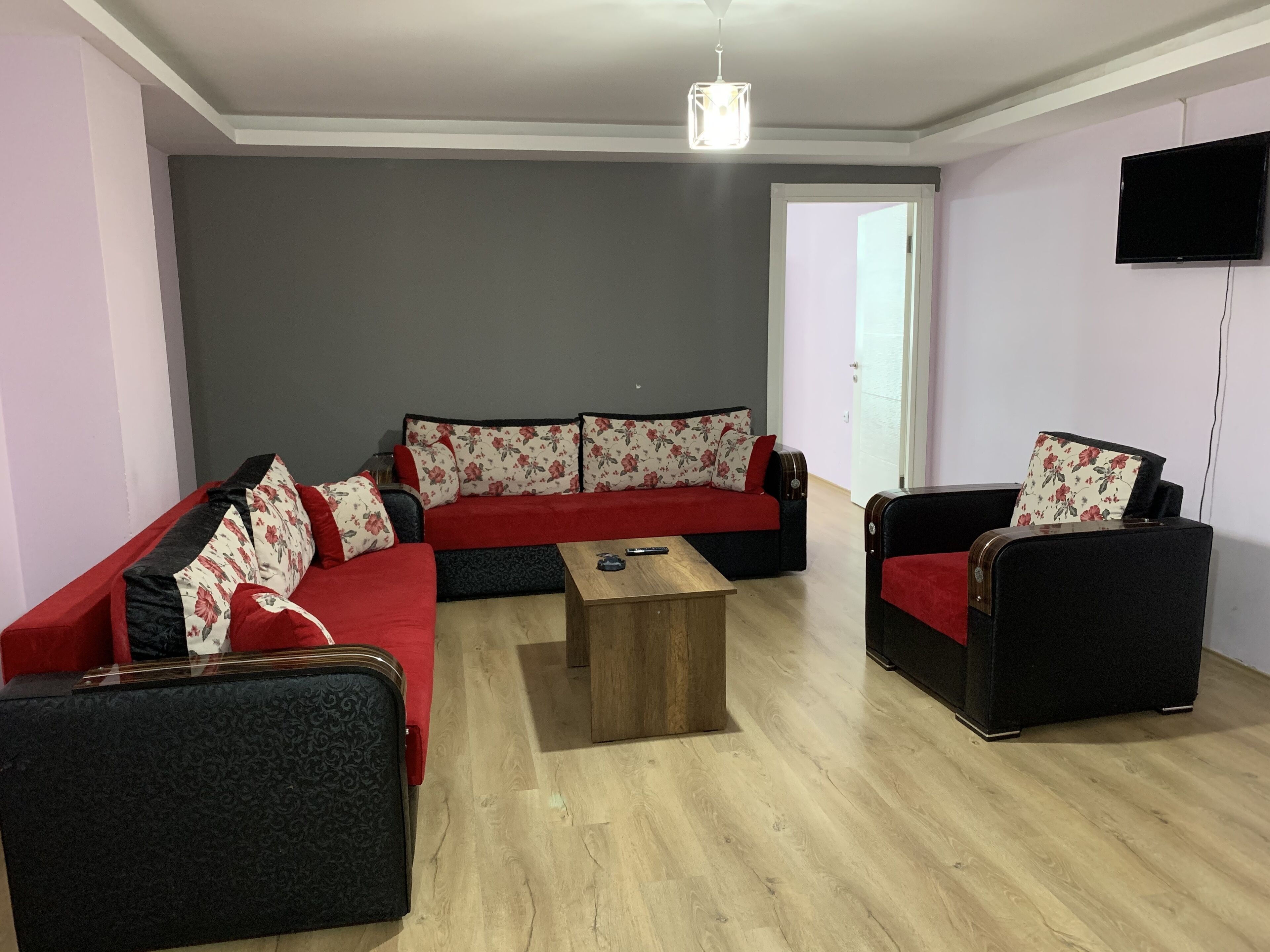 Standard Suite | Living room | 39-inch plasma TV with satellite channels, TV, heated floors