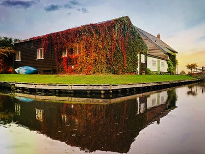 Spend the night in the heart of Giethoorn on the village canal