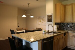 Fridge, microwave, oven, stovetop - Luxury Legacy Dunes condo close to Disney, Golf and Orlando Fun! (Kissimmee)