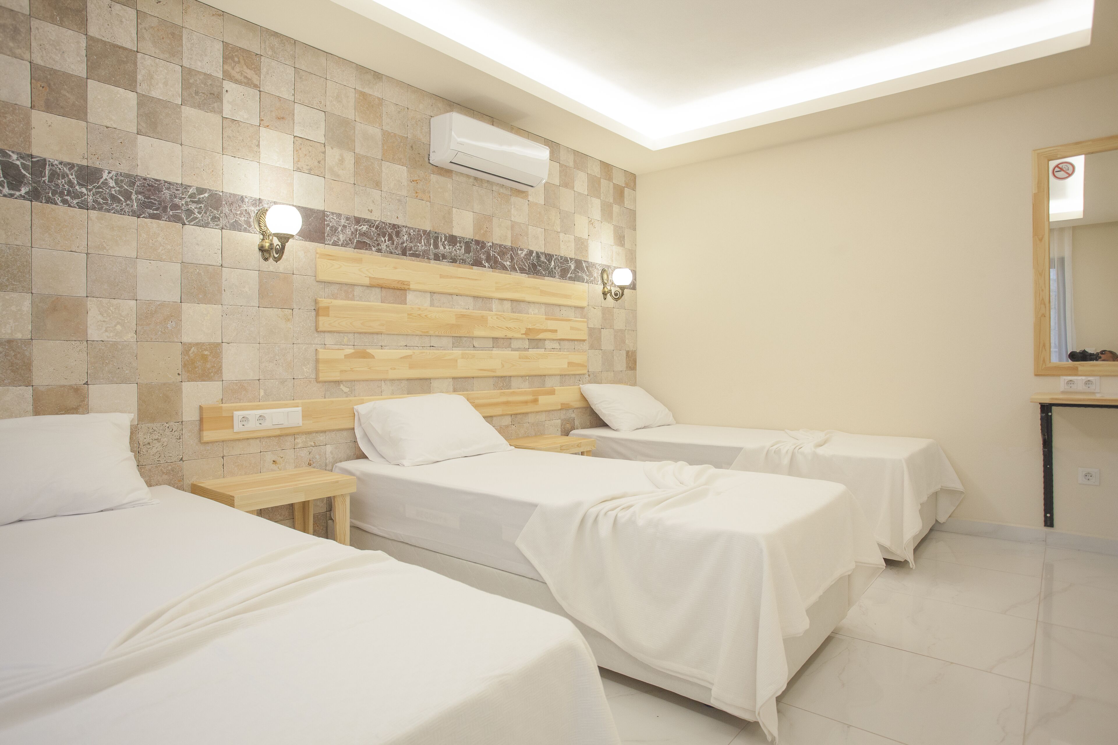 economy triple room | laptop workspace, blackout curtains, soundproofing, free wifi