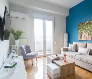 Apartment, 1 Bedroom | Living area | 20-inch flat-screen TV with cable channels, Smart TV - 58m² Renovated Apartment in Agkilis street (Athens)
