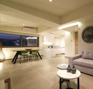 Apartment, 1 Bedroom | Living area | 20-inch flat-screen TV with cable channels, Smart TV