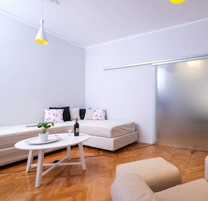 Classic Apartment, 1 Bedroom (B) | Living room | 20-inch Smart TV with cable channels, TV