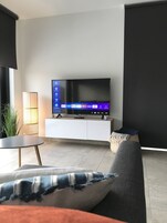 Apartamento familiar (Eb & Vloed) | Zona de estar | Una Smart TV, Netflix, suelo radiante, servicios de streaming