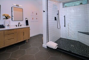 Bathtub, hair dryer, towels